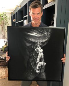 Josh Brolin with a print by Lee Jeffries